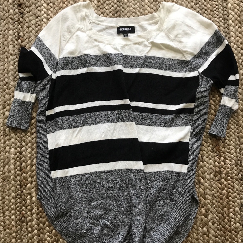 Round hem sweater